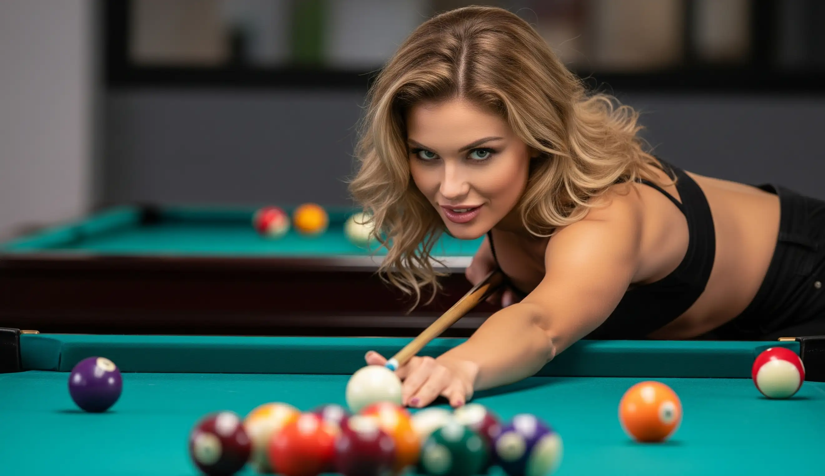 Beautiful woman playing Billiards
